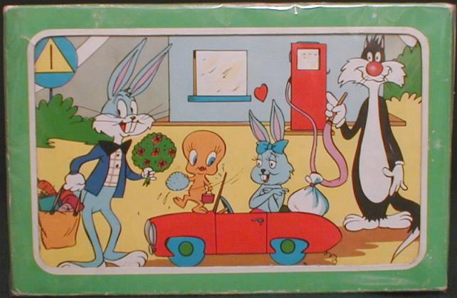 2 sheets of USPS stamps, One Bugs Bunny, One Sylvester and Tweety